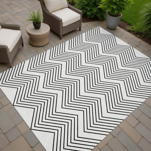 HomeRoots 5' X 8' Ivory and Black Geometric Area Rug - Washable, Stylish & Durable for Indoor/Outdoor Use! 690100