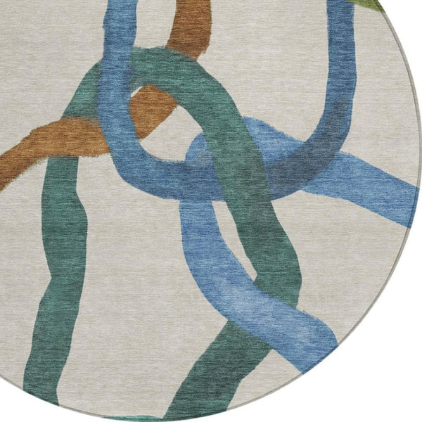 HomeRoots 8' Round Abstract Area Rug in Beige, Blue & Green – Washable, Stain-Resistant for Indoor/Outdoor Use 690245