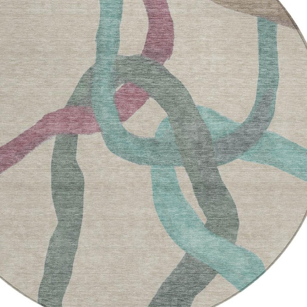 HomeRoots 8' Round Abstract Area Rug in Tan, Blue & Mauve - Stylish, Washable, Durable for Indoor & Outdoor Use 690281