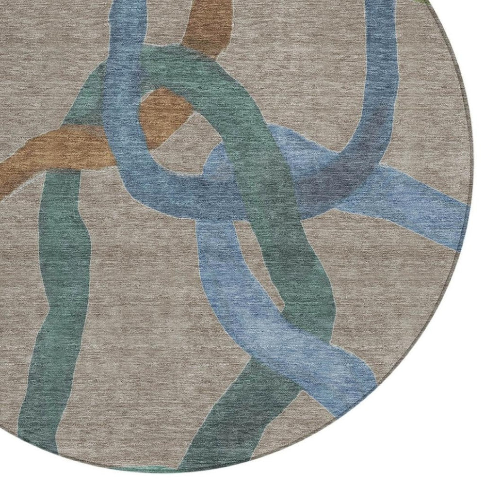 HomeRoots 8' Contemporary Taupe Blue & Copper Round Abstract Washable Rug for Indoor & Outdoor Spaces 690287