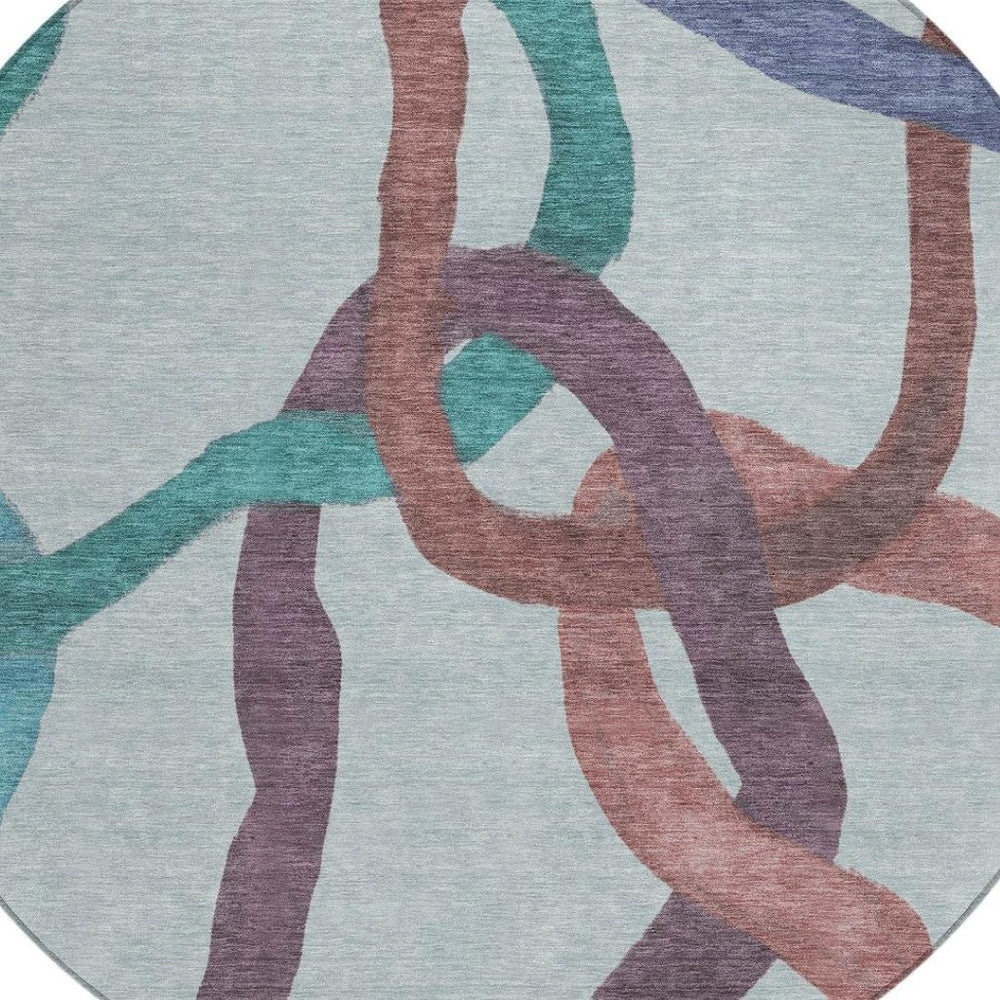 HomeRoots 8' Teal Blue Red & Mauve Round Abstract Washable Area Rug for Indoor & Outdoor Use, Easy Care! 690293