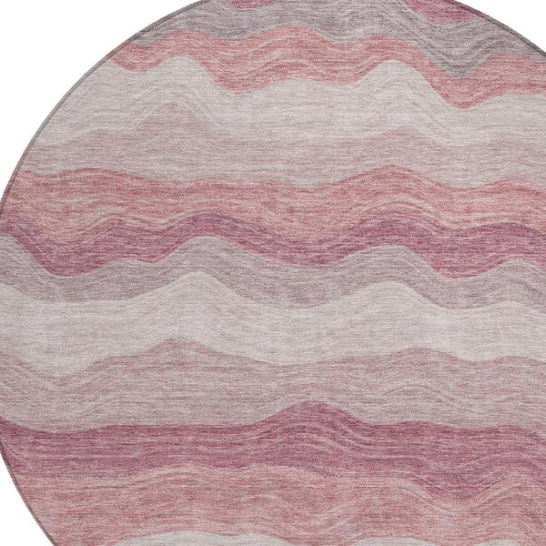 HomeRoots 8' Salmon Peach Striped Round Area Rug - Durable, Washable, Indoor/Outdoor Style for Any Space 690413