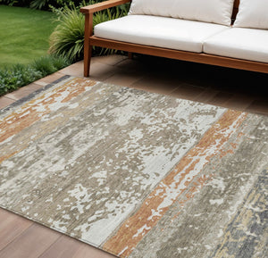 HomeRoots 9' X 12' Durable Taupe Copper Ivory Striped Washable Area Rug for Indoor Outdoor Spaces 690457