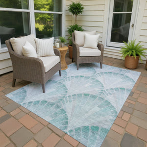 HomeRoots 9' X 12' Teal Blue Seashell Indoor Outdoor Area Rug - Durable, Washable, Coastal Charm for Any Space 690583