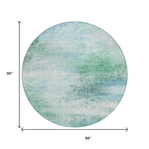 HomeRoots 8' Round Abstract Area Rug in Mint Green, Teal & Ivory - Washable, Durable for Indoor/Outdoor Use 690599
