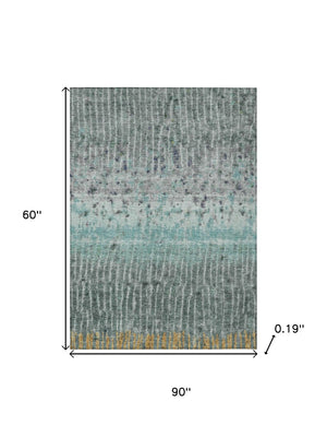 HomeRoots 5' X 8' Teal Blue Gold Gray Abstract Area Rug - Washable, Durable Indoor/Outdoor Modern Design 690754
