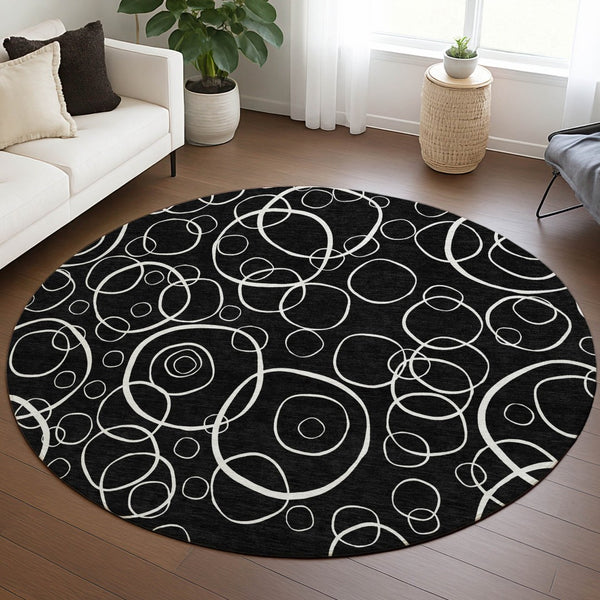 HomeRoots 8' Black And Ivory Round Geometric Rug - Washable, Durable, Stylish for Indoor & Outdoor Spaces 690767
