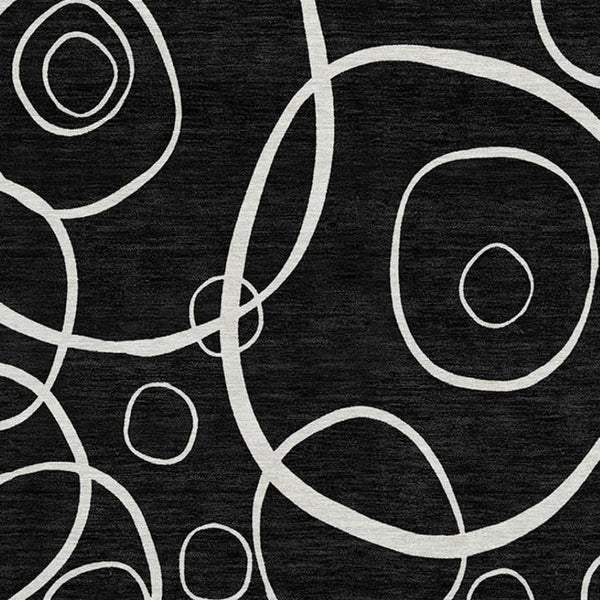 HomeRoots 8' Black And Ivory Round Geometric Rug - Washable, Durable, Stylish for Indoor & Outdoor Spaces 690767