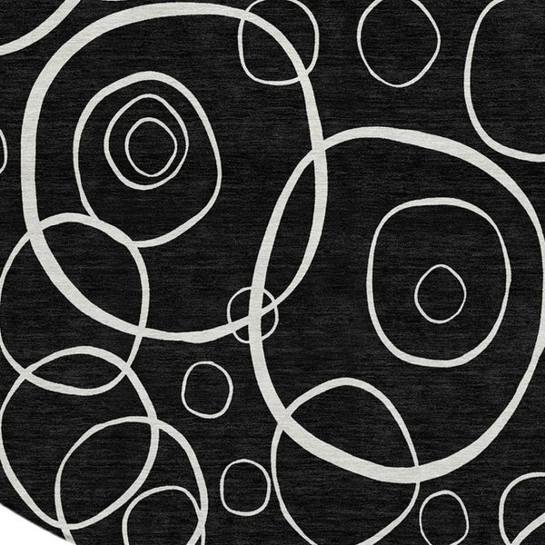 HomeRoots 8' Black And Ivory Round Geometric Rug - Washable, Durable, Stylish for Indoor & Outdoor Spaces 690767