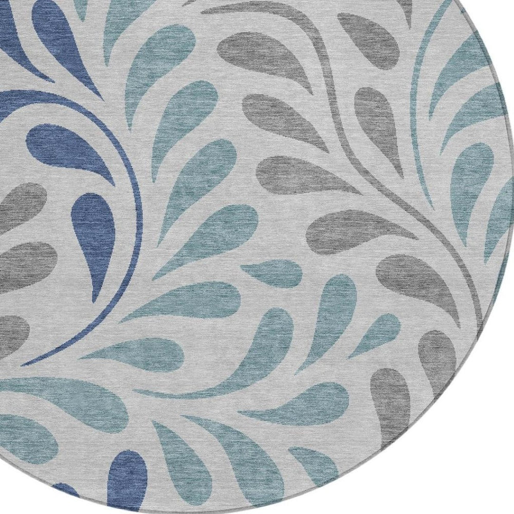 HomeRoots 8' Round Botanical Leaves Area Rug in Silver, Blue & Gray – Washable, Stain-Resistant, Versatile Design 690964