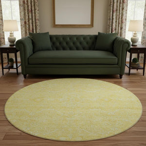 HomeRoots 8' X 8' Gold And Ivory Floral Round Rug - Washable, UV Protected, Stain Resistant for Easy Care 691755