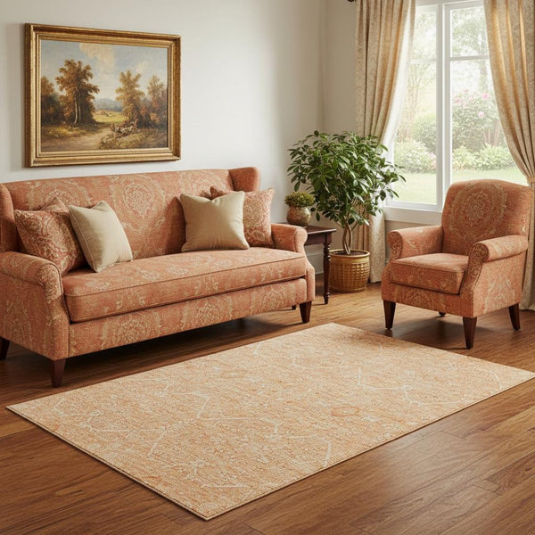 HomeRoots 5' X 8' Salmon and Ivory Floral Area Rug – Washable, UV-Protected, Pet-Friendly Home Decor Piece 691772