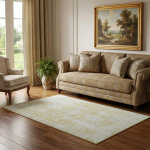 HomeRoots 5' X 8' Elegant Gold and Silver Oriental Washable Area Rug with UV Protection for Any Space 691994