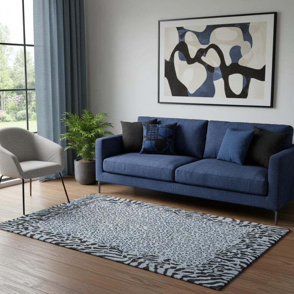 HomeRoots 5' X 8' Stylish Blue and Black Animal Print Washable Area Rug with UV Protection for Easy Care 692030