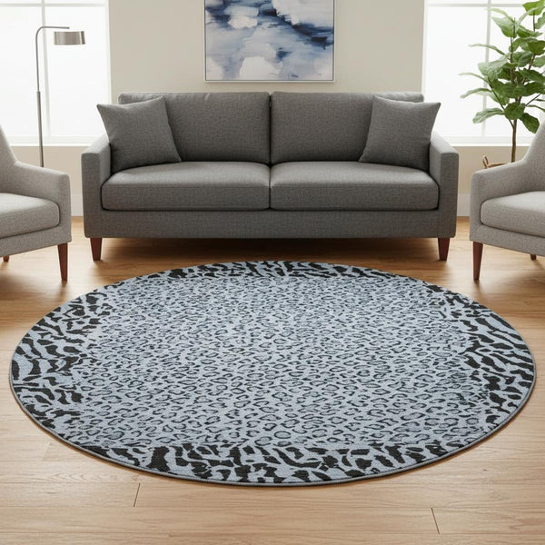 HomeRoots 8' X 8' Stylish Blue & Black Animal Print Washable Round Rug with UV Protection, Perfect for Any Room! 692031