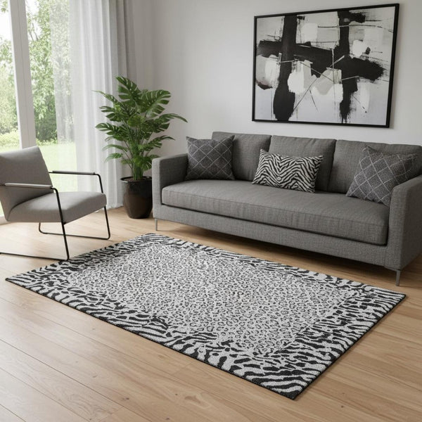 HomeRoots 5' X 8' Gray And Black Animal Print Washable Area Rug - Durable, UV-Protected, Modern Design for Any Room 692042