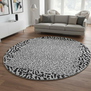 HomeRoots 8' X 8' Gray and Black Animal Print Round Rug - Washable, UV Protected, Soft, and Non-Slip Design 692043