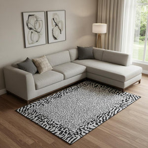 HomeRoots 9' X 12' Gray and Black Animal Print Washable Area Rug - Durable, UV-Protected, Easy-Clean Style! 692045