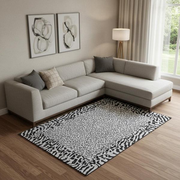 HomeRoots 9' X 12' Gray and Black Animal Print Washable Area Rug - Durable, UV-Protected, Easy-Clean Style! 692045