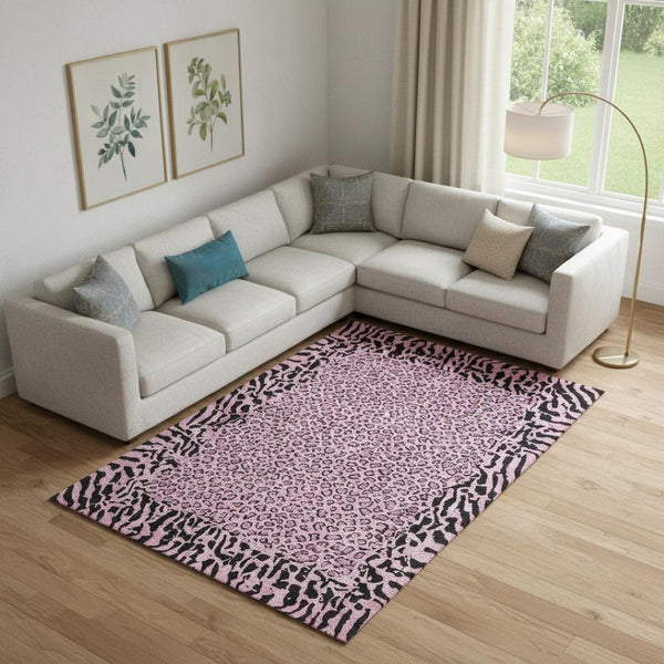 HomeRoots 10' X 14' Pink and Black Animal Print Washable Area Rug with UV Protection for Stylish Spaces 692052
