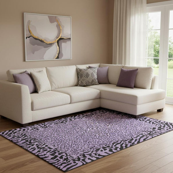 HomeRoots 8' Purple and Black Animal Print Area Rug - Washable, UV Protected, Durable for High-Traffic Spaces 692056