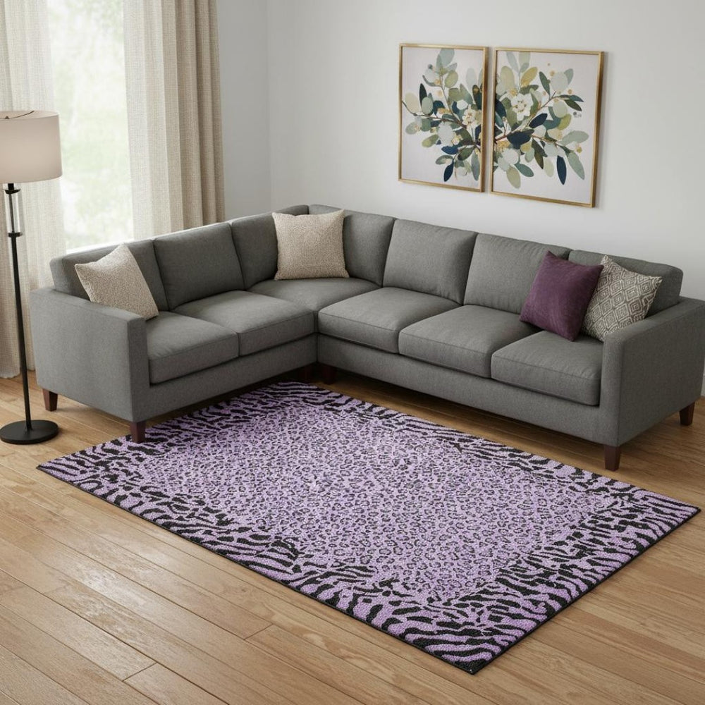 HomeRoots 9' X 12' Purple Animal Print Area Rug - Washable, Stain-Resistant, UV Protected, Non-Slip Design 692057