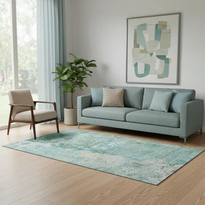 HomeRoots 5' X 8' Washable Area Rug in Emerald, Pale Aqua & Ivory – Stain Resistant with UV Protection! 692174