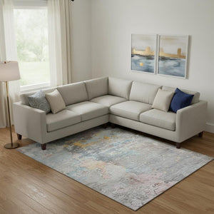 HomeRoots 10' X 14' Abstract Washable Area Rug in Granite Gray, Teal & Blush with UV Protection for Homes 692184