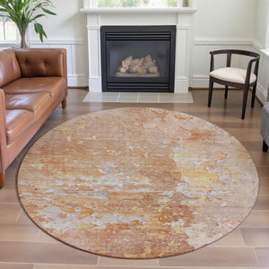 HomeRoots 8' X 8' Salmon Ivory Gold Abstract Round Rug - Washable, UV Protected, Non-Slip for Stylish Living Spaces 692205