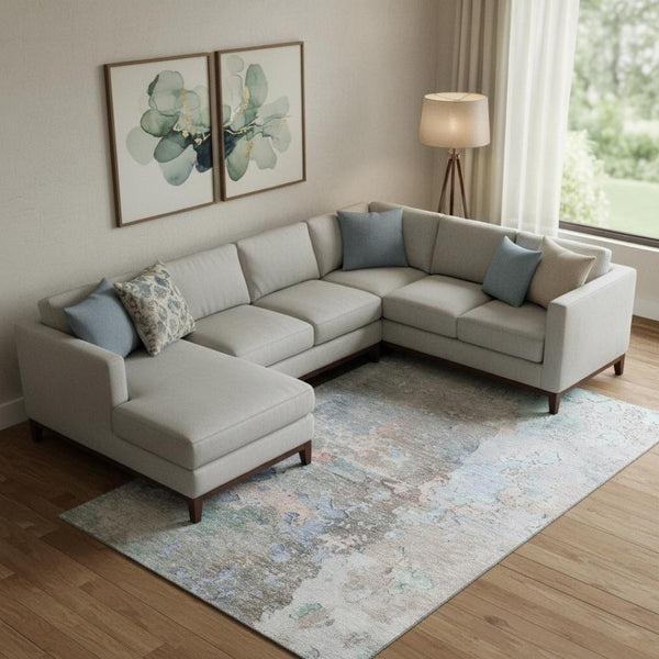 HomeRoots 9' X 12' Abstract Washable Area Rug in Taupe, Blue & Gray - UV Protection & Easy Care for Homes 692213