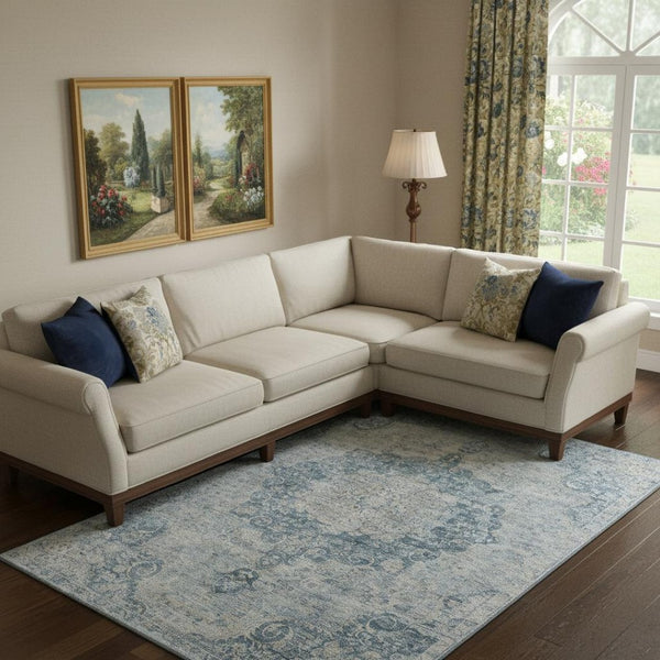 HomeRoots 10' Blue and Ivory Floral Area Rug – Washable, UV Protected, Stain Resistant for Elegant Living Spaces 692292