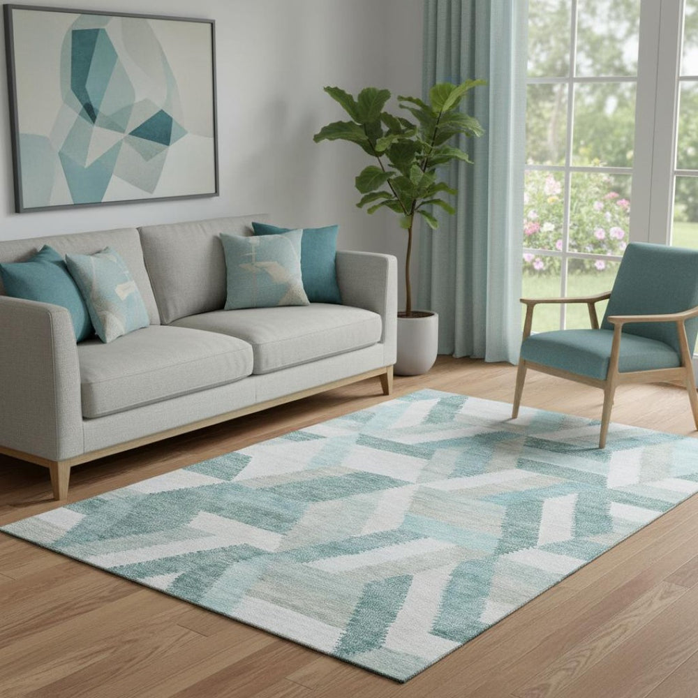 HomeRoots 5' X 8' Geometric Area Rug in Teal, Ivory & Gray - Washable, UV-Protected, Durable for Homes 692462