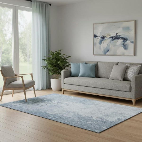 HomeRoots 5' X 8' Sky Blue & Ivory Abstract Washable Area Rug - UV Protection, Stain Resistant, Durable Design 692579