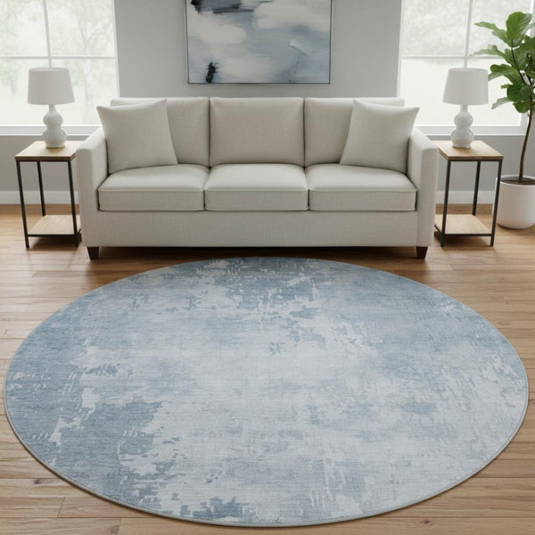 HomeRoots 8' X 8' Sky Blue & Ivory Abstract Round Rug - UV Protected, Washable & Kid-Friendly for Every Space 692580