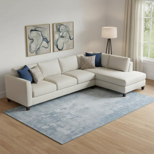 HomeRoots 9' X 12' Sky Blue & Ivory Abstract Area Rug - Washable, UV Protected, Durable & Stylish for Busy Homes 692582