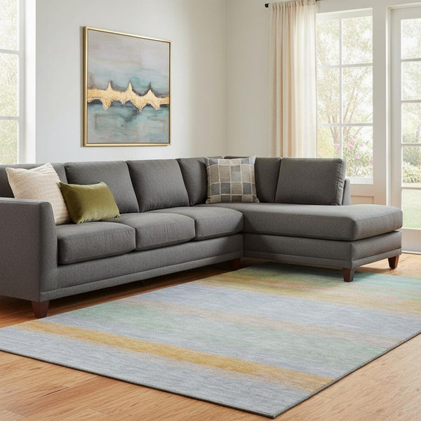 HomeRoots 8' Vibrant Striped Washable Area Rug in Lavender, Orange, and Teal with UV Protection & Non-Slip Backing 692659