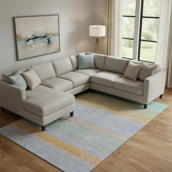HomeRoots 9' X 12' Striped Area Rug in Lavender, Orange & Teal – Washable, UV Protected & Perfect for Any Space 692660