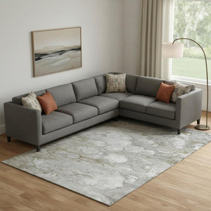 HomeRoots 9' X 12' Modern Abstract Washable Area Rug in Taupe, Ivory & Gray with UV Protection for Durability 692696