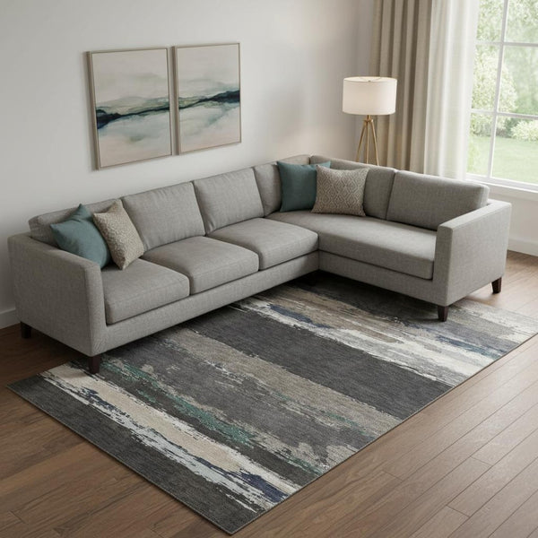 HomeRoots 9' X 12' Modern Abstract Area Rug in Black, Beige & Blue - Washable, UV Protected & Durable Design 692702