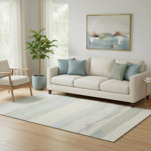 HomeRoots 5' X 8' Stylish Ivory, Mint Green & Teal Abstract Washable Area Rug with UV Protection & Durability 692717