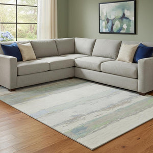HomeRoots 8' Modern Abstract Area Rug in Ivory, Mint Green & Teal – Washable, UV Protected & Stain Resistant! 692719