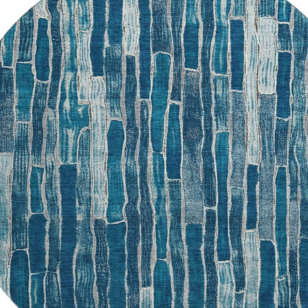 HomeRoots 8' X 8' Blue and Ivory Striped Round Rug - Stylish, Washable, UV-Protected for High-Traffic Areas 692847