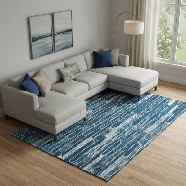 HomeRoots 9' X 12' Coastal Blue and Ivory Striped Washable Area Rug with UV Protection for Family Spaces 692849