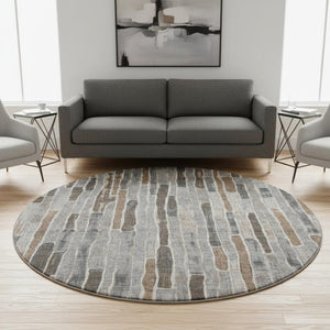 HomeRoots 8' X 8' Versatile Pewter Gray & Silver Striped Washable Round Rug with UV Protection & Non-Slip Backing 692877