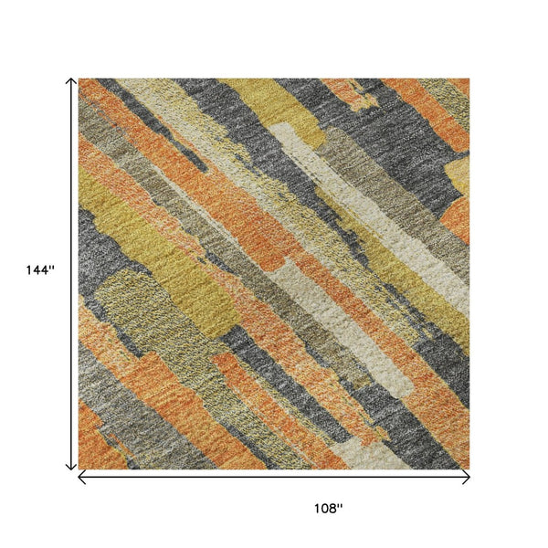 HomeRoots 9' X 12' Vibrant Orange Gold Ivory Striped Washable Area Rug with Non-Slip Backing & UV Protection 692945