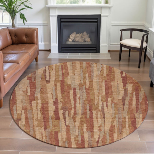 HomeRoots 8' X 8' Round Salmon Brick Red & Gold Striped Washable Rug - UV Protected, Stain Resistant & Durable 692955