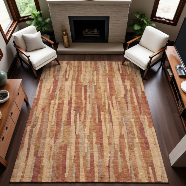 HomeRoots 10' X 14' Salmon Brick Red & Gold Striped Area Rug - Washable, UV Protected, Non-Slip, Family Friendly 692958
