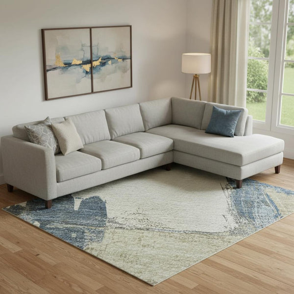 HomeRoots 10' X 14' Abstract Washable Area Rug in Beige, Blue & Ivory - UV Protected, Durable & Easy Care! 693036