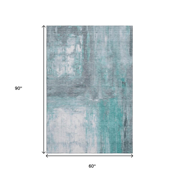 HomeRoots 5' X 8' Teal Gray Silver Abstract Washable Area Rug - UV Protected, Stain Resistant & Non-Slip Design 693158