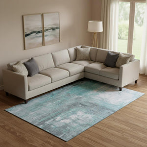 HomeRoots 9' X 12' Teal Gray Silver Abstract Washable Area Rug - Stain-Resistant, UV-Protected, Stylish Decor 693161